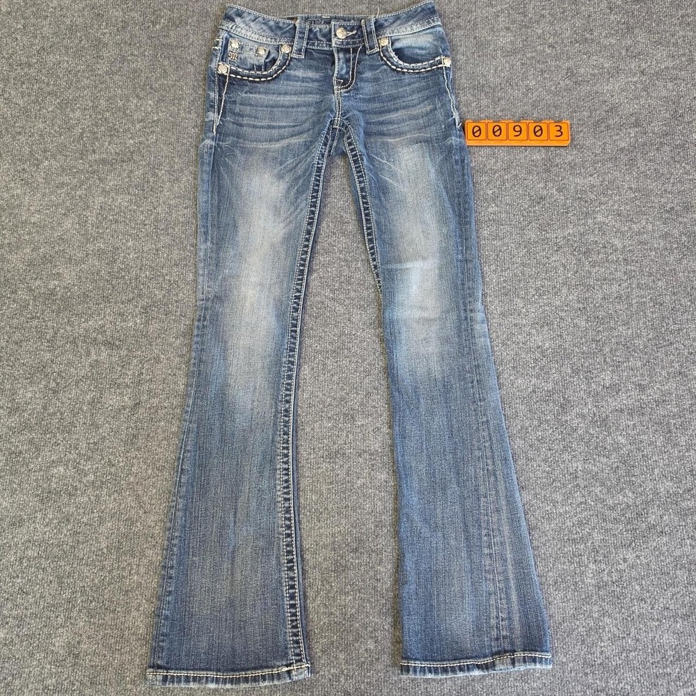 Miss Me bootcut jeans with embroidered floral designs on back pockets, size 25